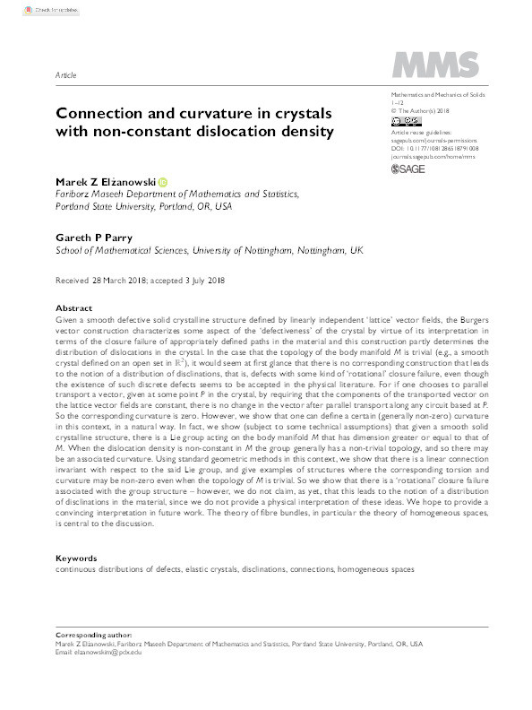 Connection and curvature in crystals with non-constant dislocation density Thumbnail